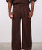 THE DOUBLE-PLEAT LINEN BLEND PANTS  — MENS BROWN