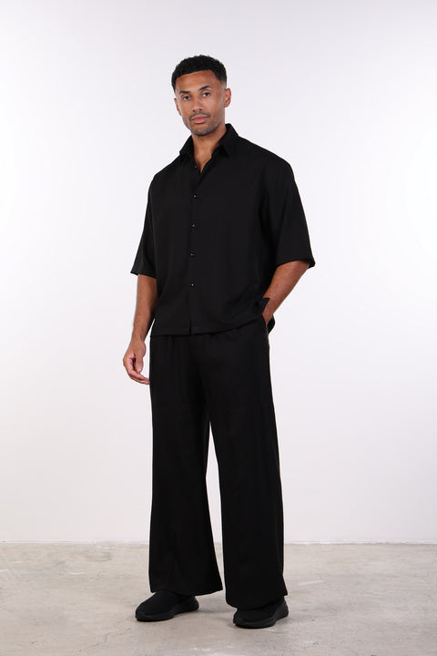 THE DOUBLE-PLEAT LINEN BLEND PANTS  — MENS BLACK